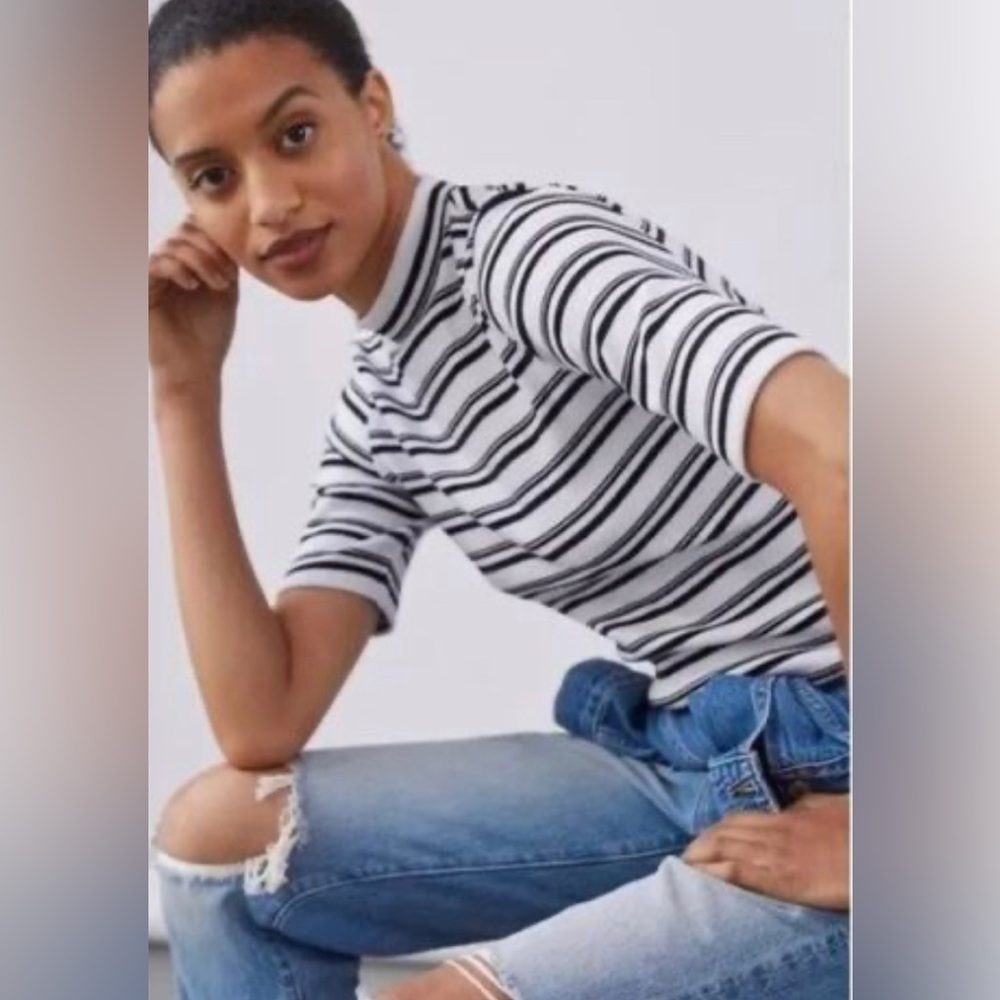 Anthropologie Maeve Striped Mock
Neck Knit Top Black & White Size
Medium